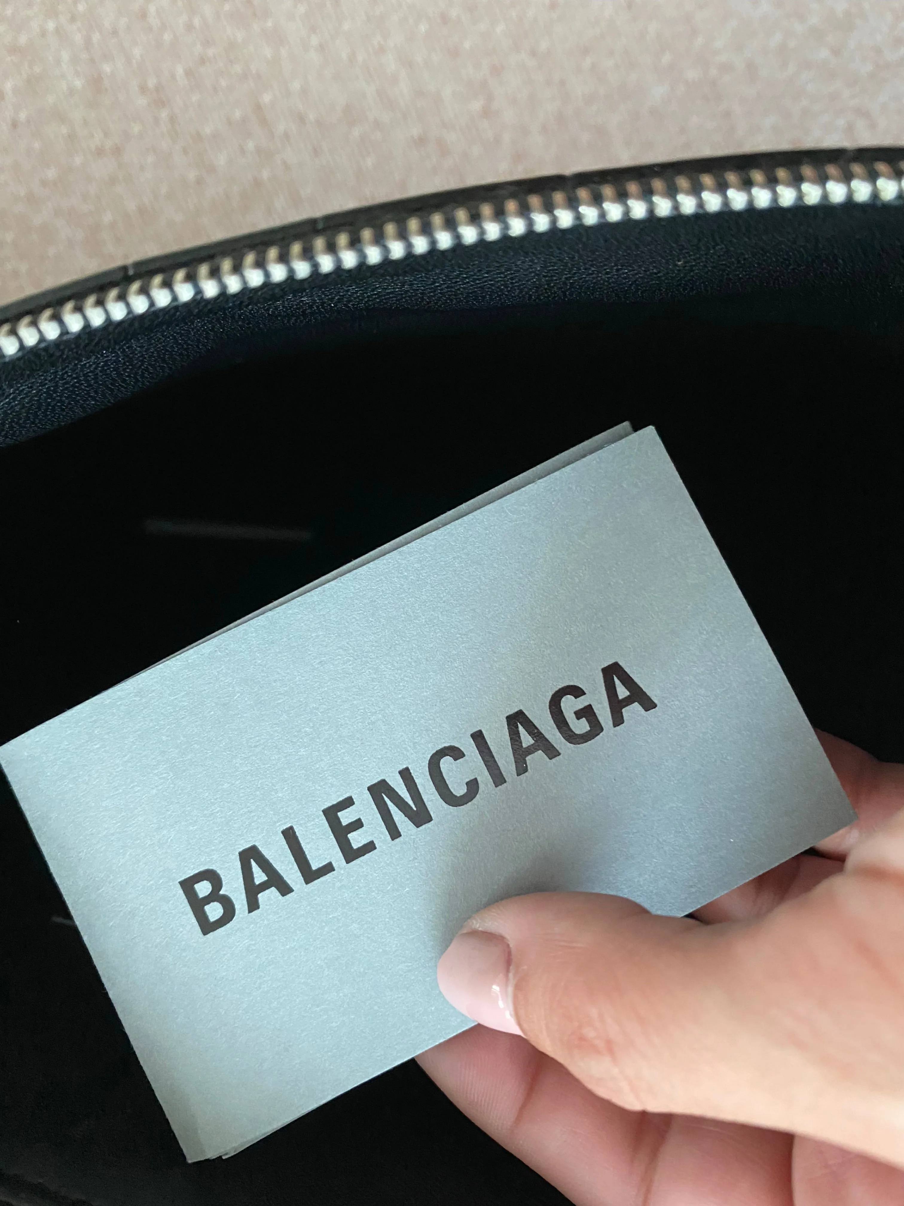 Balenciaga logo clutch