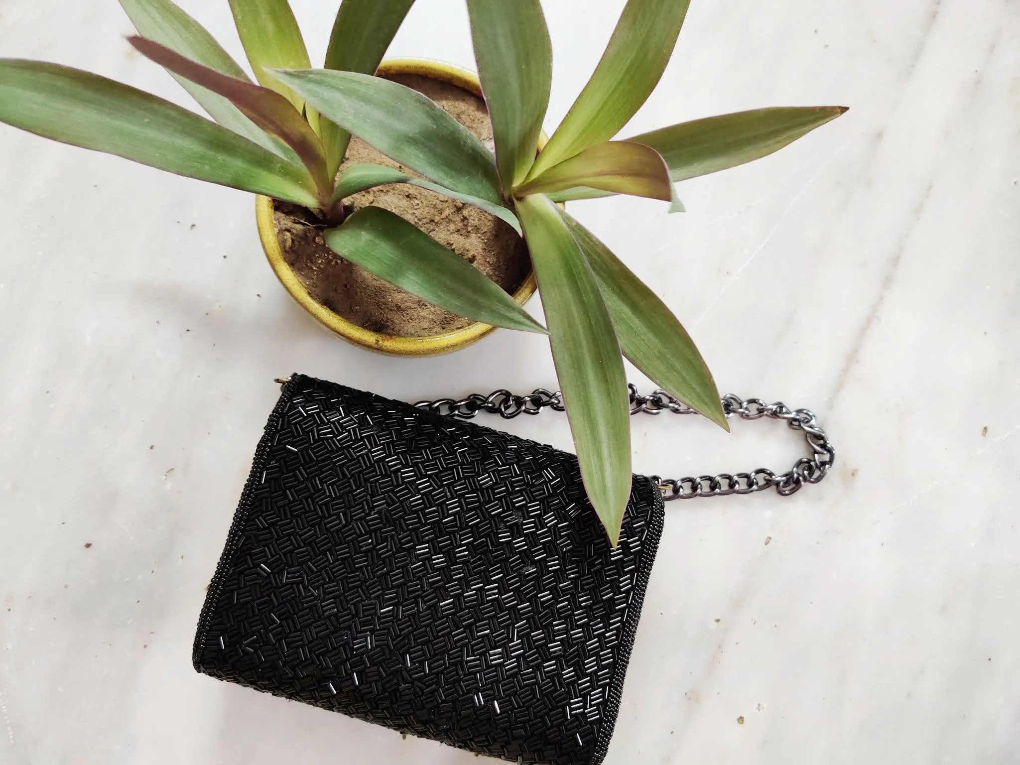 Black Weave Flapover Clutch - Rent