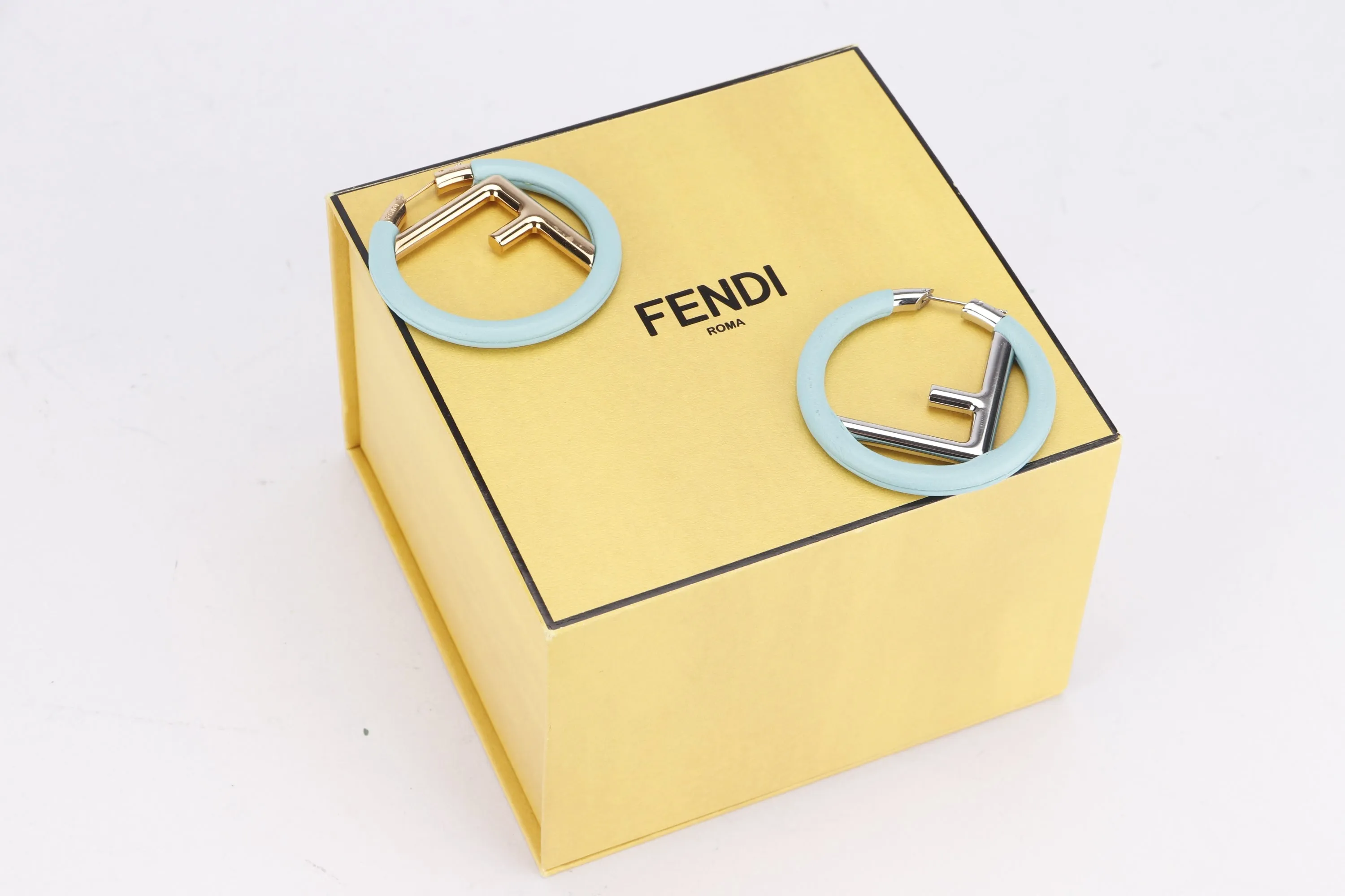 FENDI GOLD AND SILVER INITIALS WITH TURQUOISE LEATHER ROUND SHAPE EARRING, WITH BOX